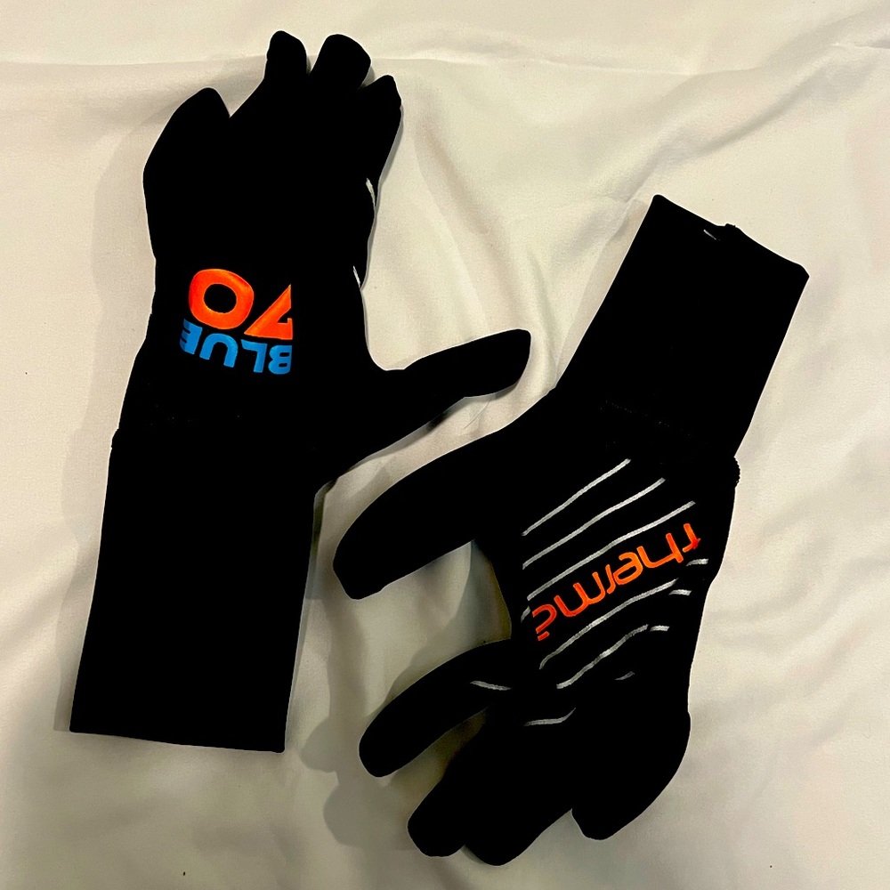 Booties and Gloves for the ocean. Brand new. Never used. Booties size 7.